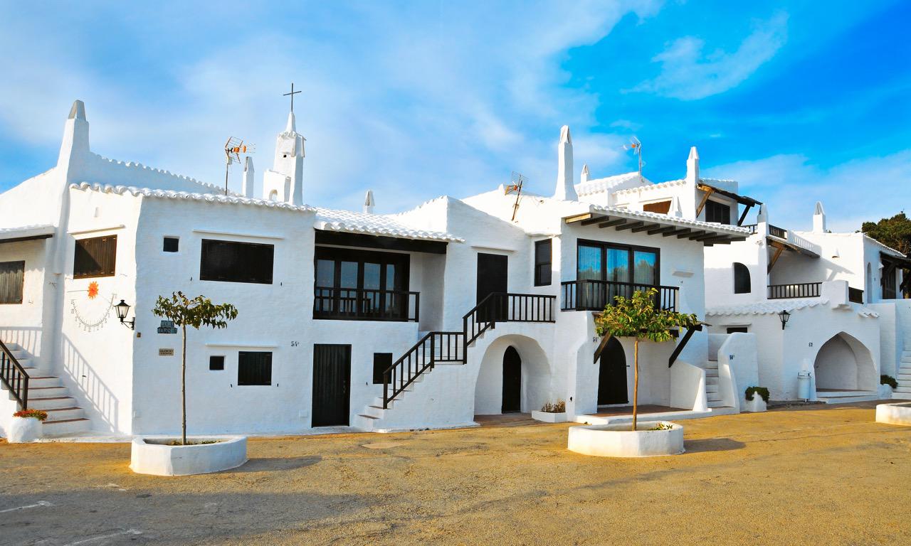 Traditional white-washed houses in Binibeca town