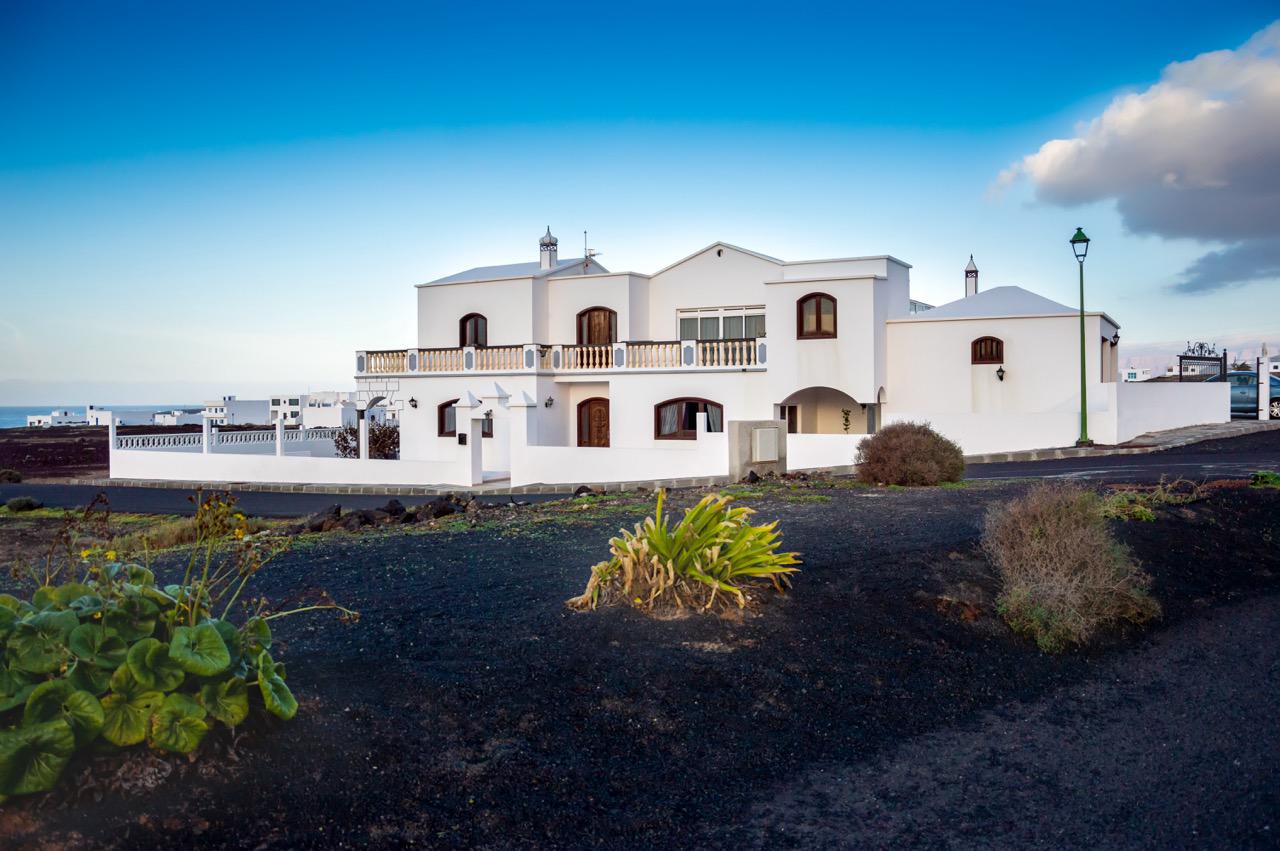 A big white villa on volcanic land in Lanzarote