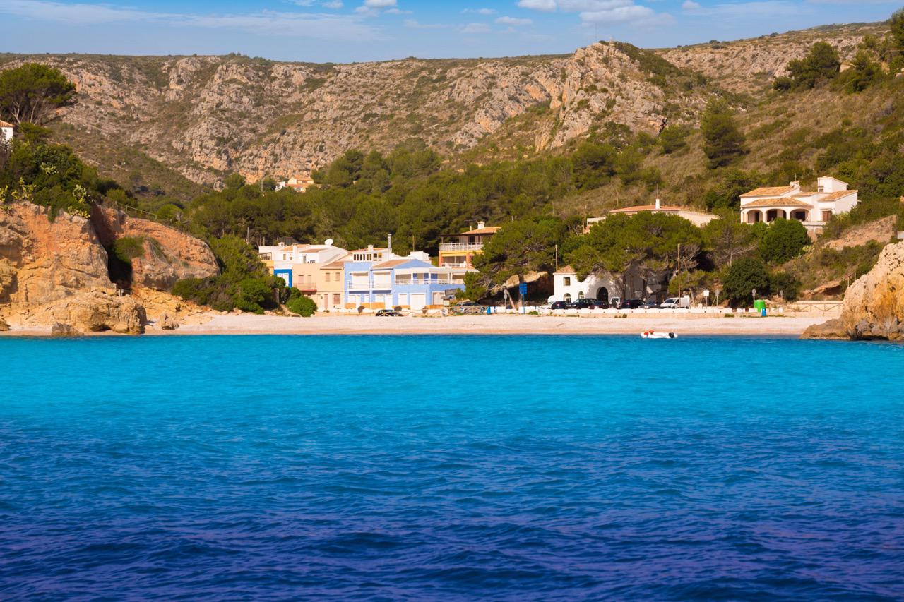 The quaint shoreline and beach of Cala Granadella, Jávea Costa Blanca