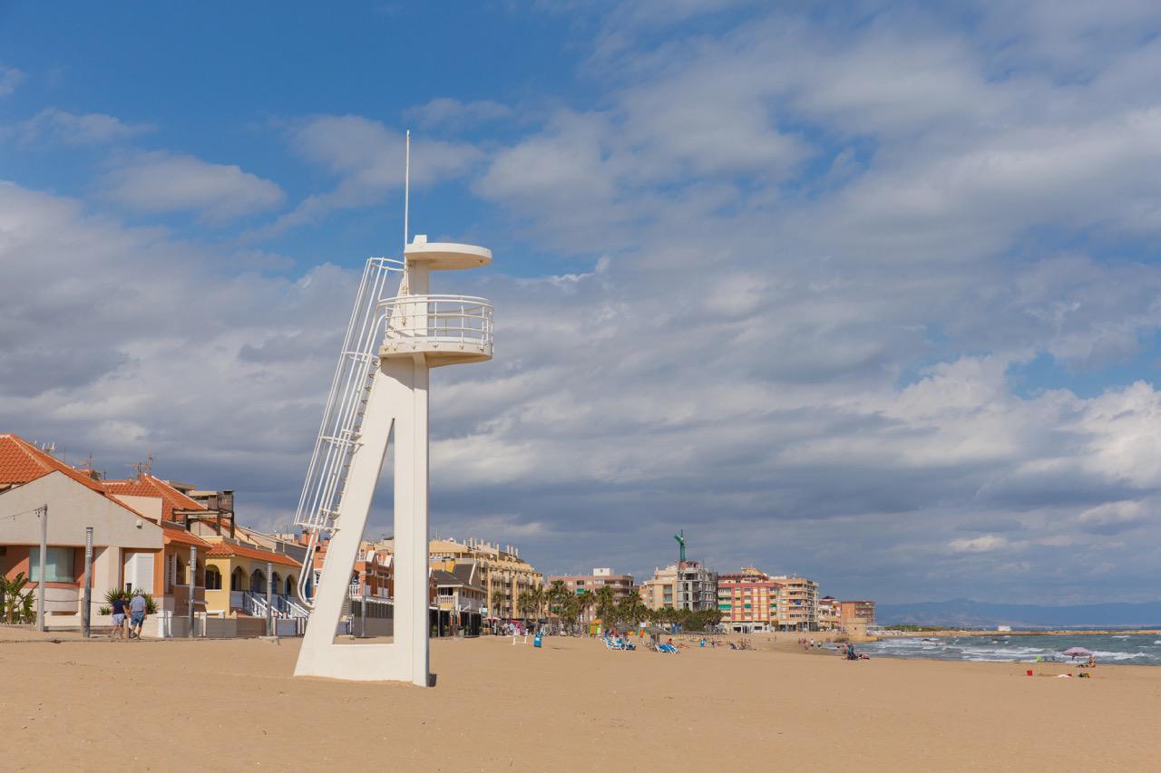 Guard tower and sandy beach La Mata Beach Torrevieja Costa Blanca